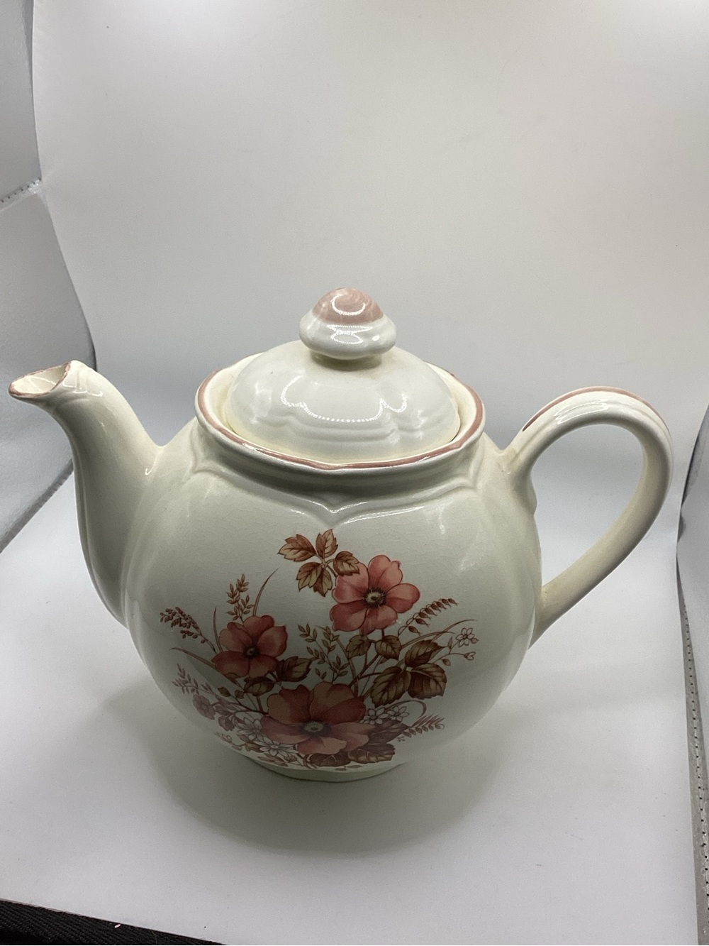 vintage Japanese ceramic teapot, commonly referred to as the "Peach Blossom